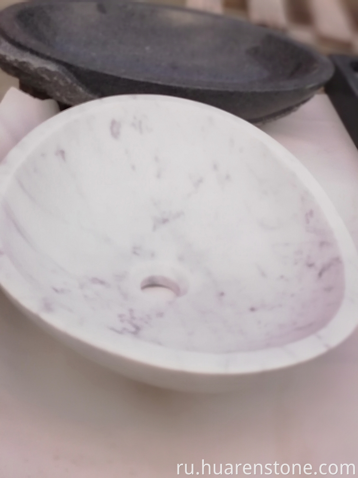 white marble vessel sink